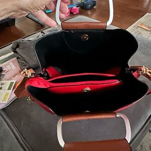 Chic Brown and Red Shoulder Bag with Structured Design